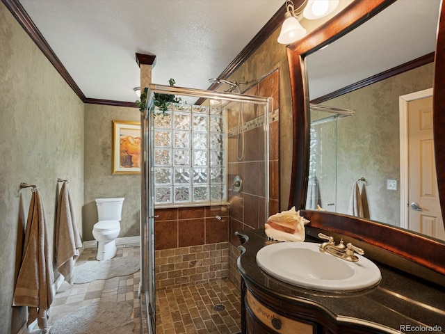 109 Bear Creek Ln, Morrison, CO 80465 - bathroom featuring crown molding, a stall shower, and vanity
