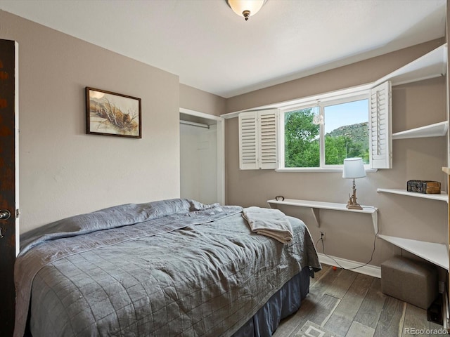 109 Bear Creek Ln, Morrison, CO 80465 - bedroom with wood finished floors and baseboards
