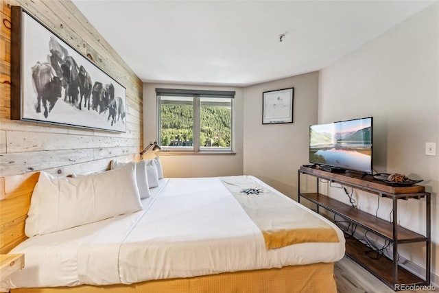 bedroom featuring wood-type flooring