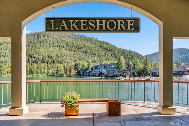22174 US Highway 6 Unit 1535, Dillon, CO 80435 - view of patio / terrace featuring a forest view and a water and mountain view