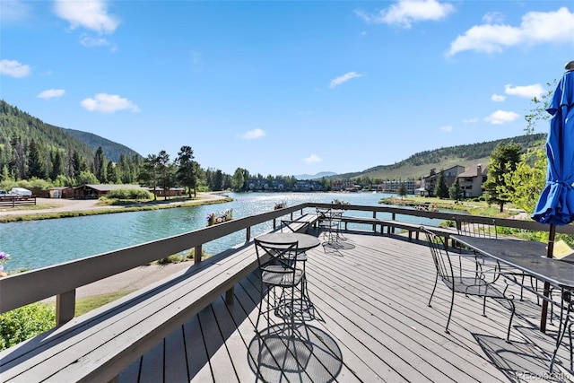 dock area with a water and mountain view