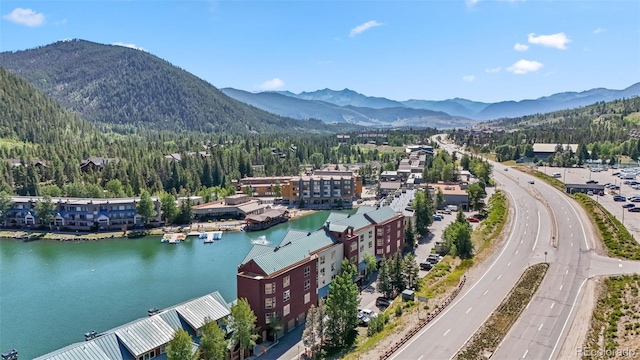 bird's eye view featuring a water and mountain view