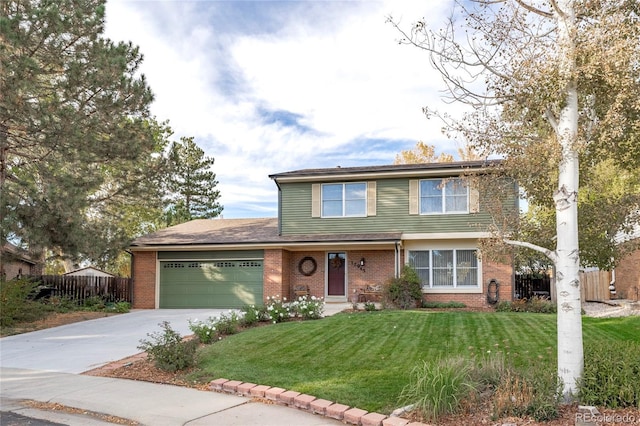 traditional-style house featuring brick siding, concrete driveway, an attached garage, a front yard, and fence