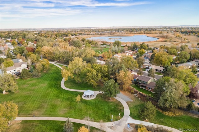 bird's eye view featuring a residential view and a water view