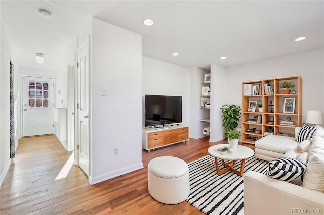 living room with hardwood / wood-style flooring