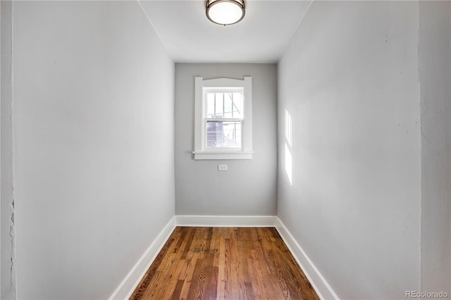 spare room with hardwood / wood-style floors