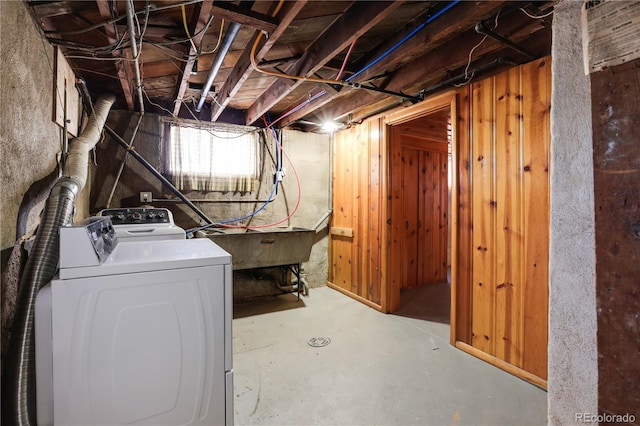 basement featuring separate washer and dryer