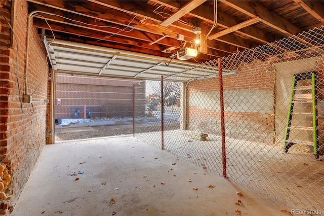 garage featuring a garage door opener