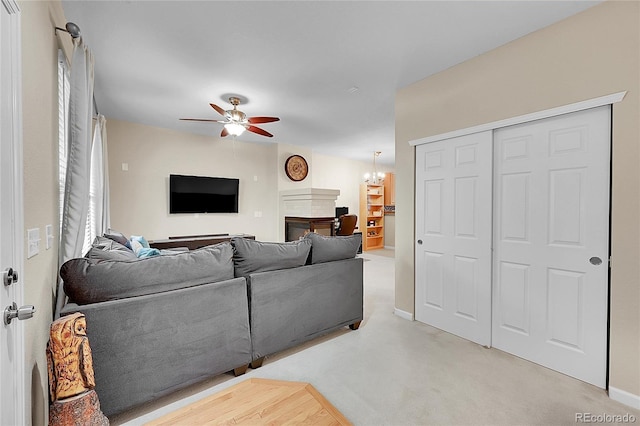 22801 E Briarwood Pl, Aurora, CO 80016 - living area featuring ceiling fan and light colored carpet