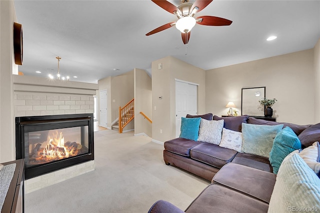 22801 E Briarwood Pl, Aurora, CO 80016 - living room with stairway, light colored carpet, a fireplace, recessed lighting, and ceiling fan