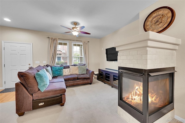 22801 E Briarwood Pl, Aurora, CO 80016 - living room with a multi sided fireplace, ceiling fan, and recessed lighting