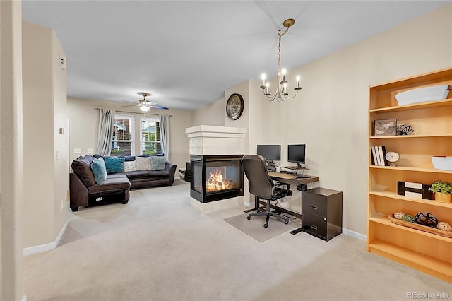 22801 E Briarwood Pl, Aurora, CO 80016 - carpeted office featuring a tiled fireplace, ceiling fan, and a chandelier