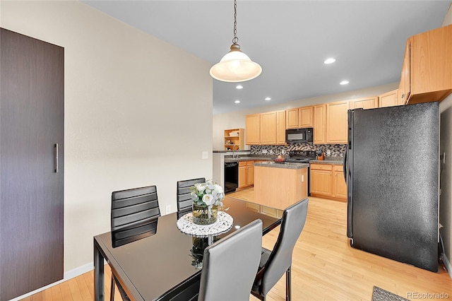 22801 E Briarwood Pl, Aurora, CO 80016 - dining area with light wood finished floors and recessed lighting