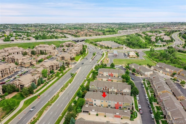 22801 E Briarwood Pl, Aurora, CO 80016 - aerial overview of property's location with a major roadway and nearby suburban area
