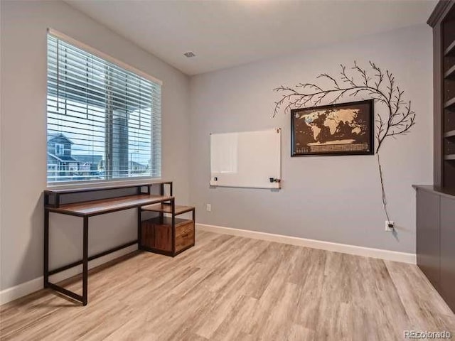 office area featuring light hardwood / wood-style flooring