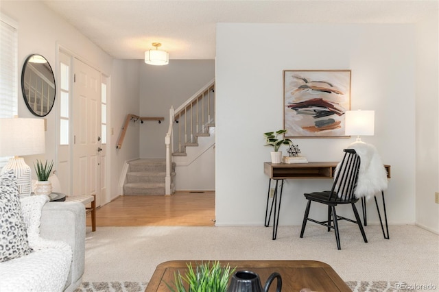 view of carpeted foyer