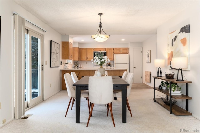 view of carpeted dining room