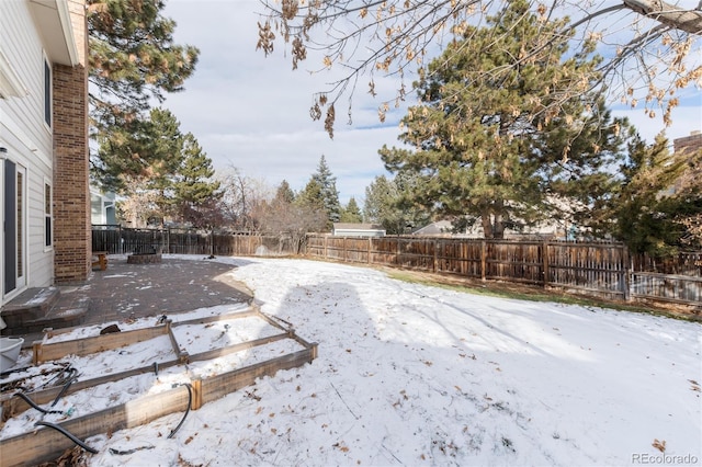 view of snowy yard