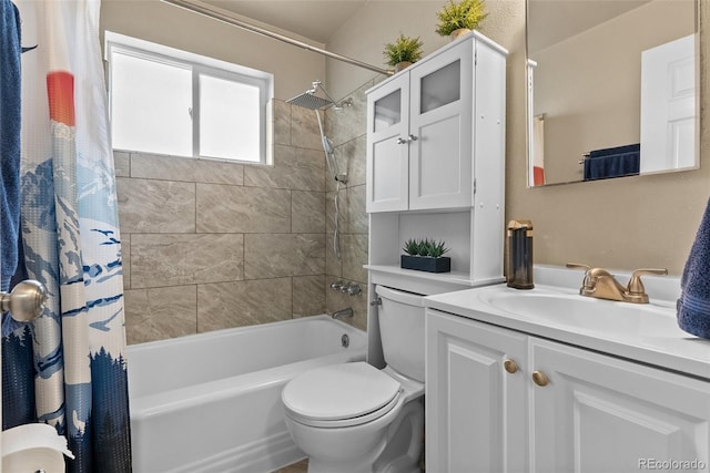 bathroom with vanity, toilet, and shower / tub combo