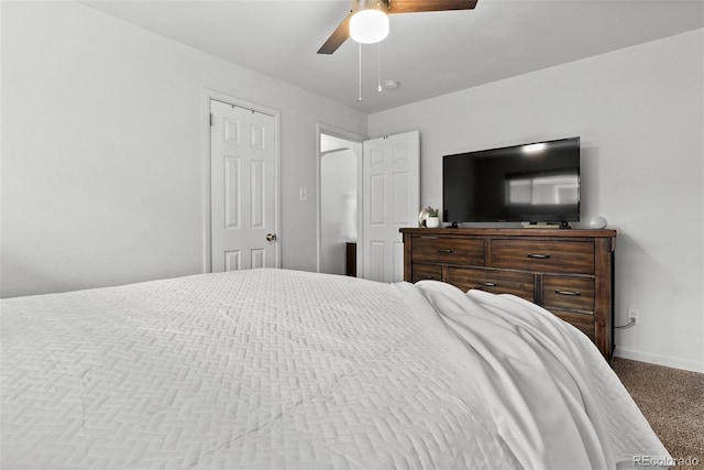 bedroom with baseboards, ceiling fan, and carpet