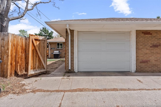 garage with fence