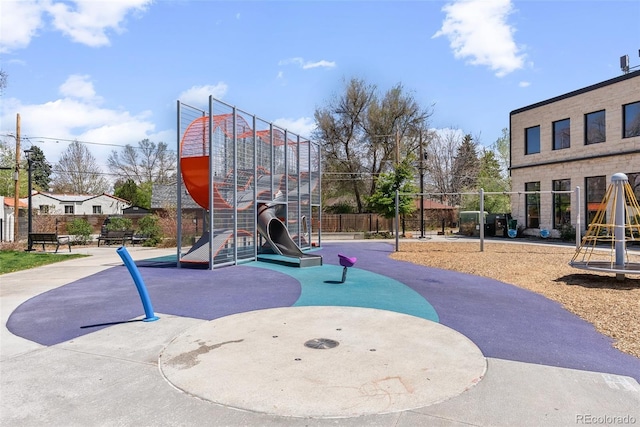 community playground featuring fence
