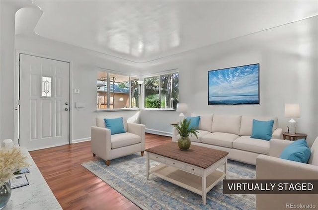 3667 Hudson St, Denver, CO 80207 - living area featuring wood finished floors and baseboards