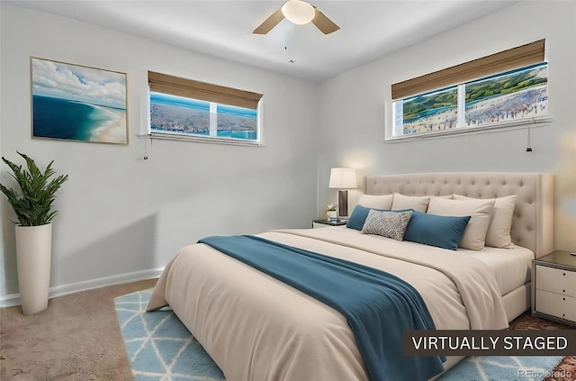 3667 Hudson St, Denver, CO 80207 - bedroom featuring baseboards, multiple windows, carpet, and ceiling fan