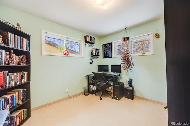 home office with light tile patterned floors