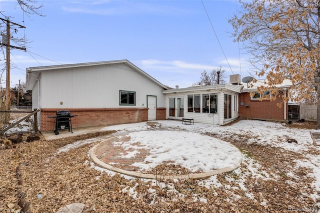 view of snow covered property