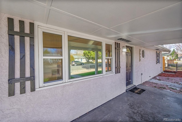 view of patio / terrace featuring visible vents