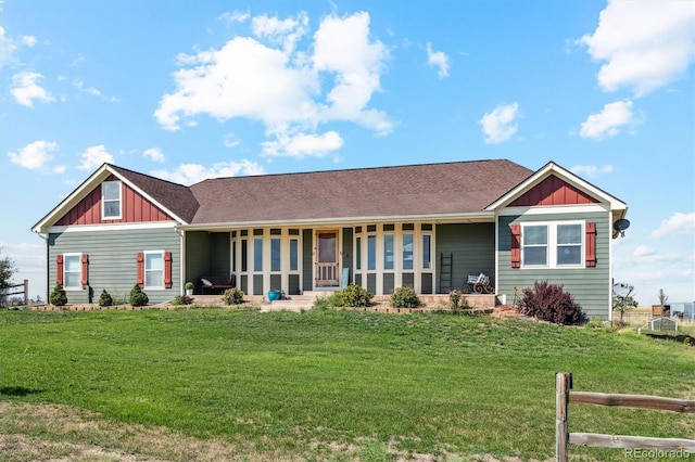 view of front of property with a front lawn