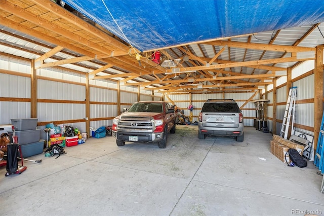 garage featuring a carport