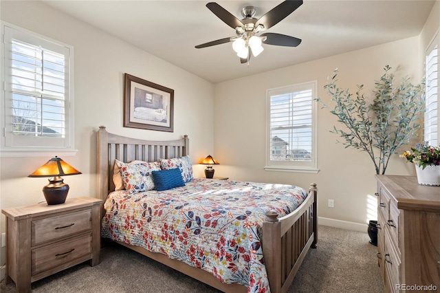 carpeted bedroom featuring a ceiling fan and baseboards