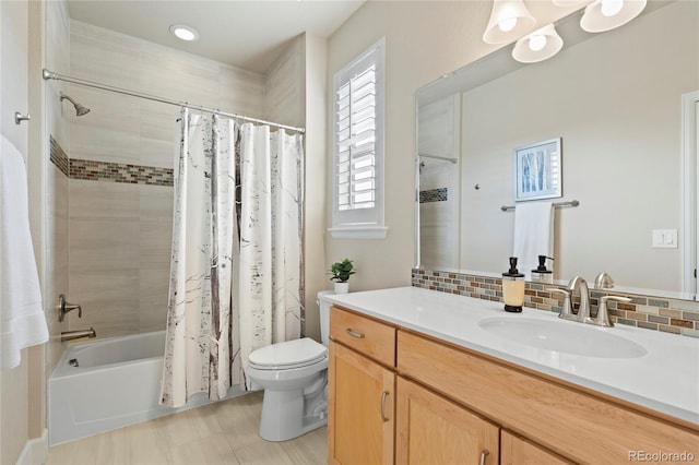 full bath with toilet, shower / bath combo with shower curtain, backsplash, and vanity