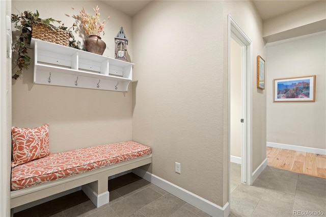 mudroom featuring baseboards