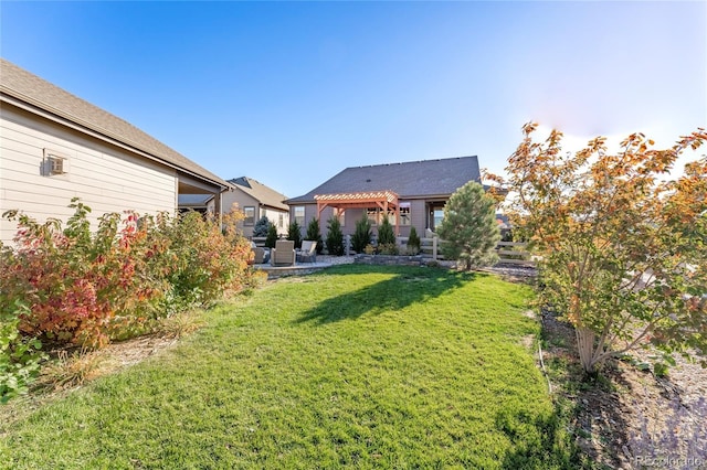 view of yard featuring a pergola and a patio