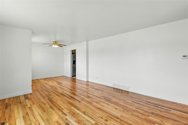 2441 E 93rd Pl, Thornton, CO 80229 - empty room with light wood finished floors and a ceiling fan