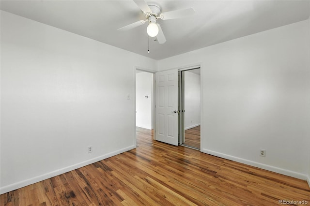 2441 E 93rd Pl, Thornton, CO 80229 - spare room featuring wood finished floors and ceiling fan