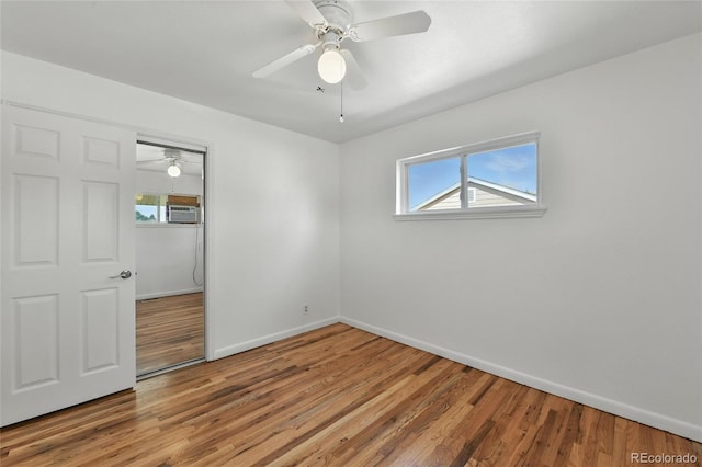 2441 E 93rd Pl, Thornton, CO 80229 - unfurnished bedroom featuring light wood-style floors, multiple windows, a ceiling fan, and a closet