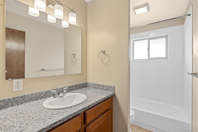 bathroom with vanity, toilet, and shower / bath combination