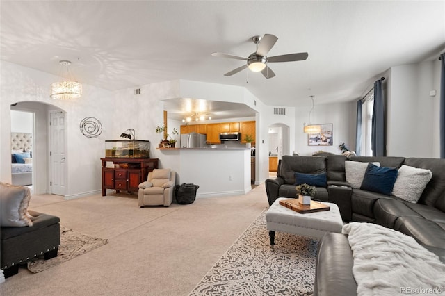 living room with light colored carpet and ceiling fan