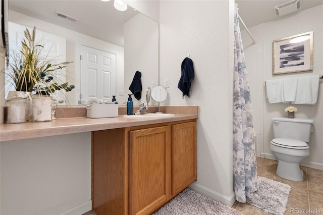 bathroom with vanity, toilet, tile patterned flooring, and a shower with curtain