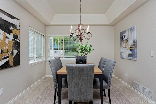 2500 Lexington St, Lafayette, CO 80026 - dining room featuring a chandelier, carpet, a raised ceiling, and baseboards