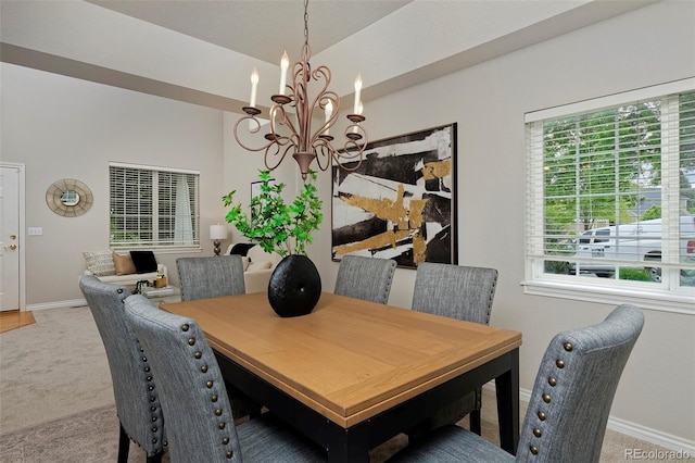 2500 Lexington St, Lafayette, CO 80026 - dining area with a chandelier, carpet, and baseboards