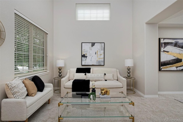 2500 Lexington St, Lafayette, CO 80026 - living area featuring carpet, healthy amount of natural light, baseboards, and a towering ceiling