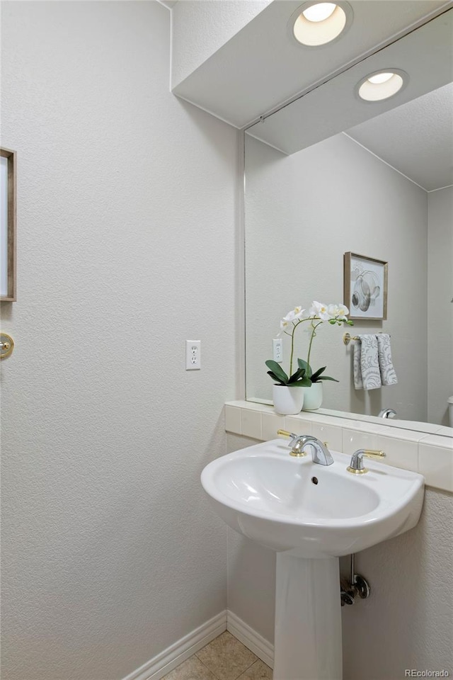 2500 Lexington St, Lafayette, CO 80026 - bathroom with baseboards and tile patterned floors