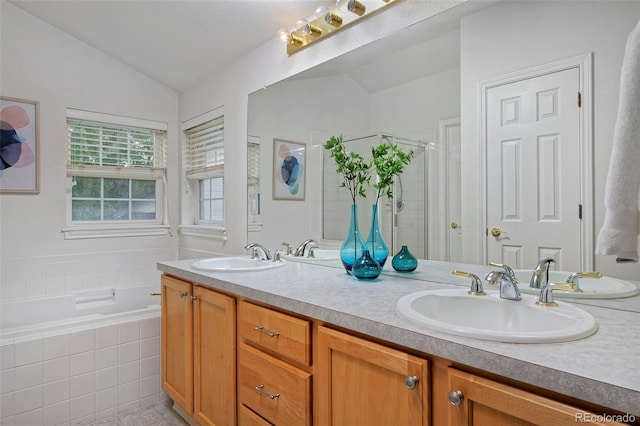 2500 Lexington St, Lafayette, CO 80026 - full bath with vaulted ceiling, a shower stall, a bath, and double vanity