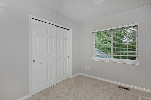 2500 Lexington St, Lafayette, CO 80026 - unfurnished bedroom with carpet floors, baseboards, and a closet