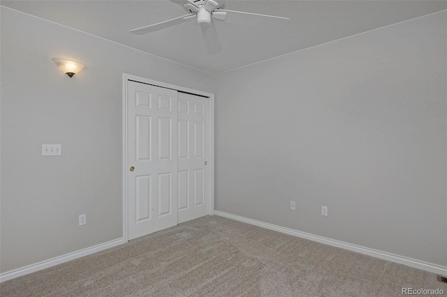 2500 Lexington St, Lafayette, CO 80026 - unfurnished bedroom featuring carpet flooring, a closet, a ceiling fan, and baseboards